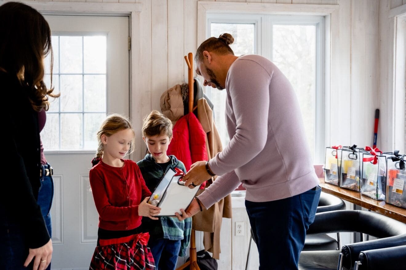 Families leaving with smiles after a Pickering community holiday photoshoot event